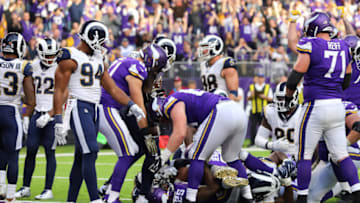 MINNEAPOLIS, MN - NOVEMBER 19: Latavius Murray #25 of the Minnesota Vikings lies in the end zone after scoring a two yard rushing touchdown in the fourth quarter of the game against the Los Angeles Rams on November 19, 2017 at U.S. Bank Stadium in Minneapolis, Minnesota. (Photo by Adam Bettcher/Getty Images)