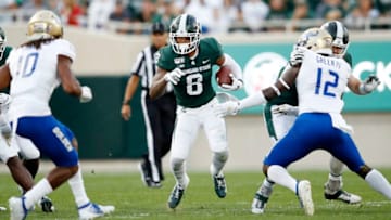 EAST LANSING, MI - AUGUST 30: Jalen Nailor #8 of the Michigan State Spartans runs with the ball against the Tulsa Golden Hurricane in the first quarter at Spartan Stadium on August 30, 2019 in East Lansing, Michigan. (Photo by Joe Robbins/Getty Images)