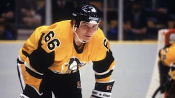 Canadian hockey player Mario Lemieux of the Pittsburgh Penguins on the ice during a road game, East Rutherford, New Jersey, 1984. (Photo by Bruce Bennett Studios/Getty Images)