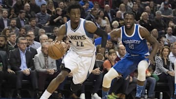 Dec 8, 2016; Toronto, Ontario, CAN; Minnesota Timberwolves forward Andrew Wiggins (22) controls a ball as Toronto Raptors forward DeMarre Carroll (5) defends during the first quarter at Air Canada Centre. Mandatory Credit: Nick Turchiaro-USA TODAY Sports