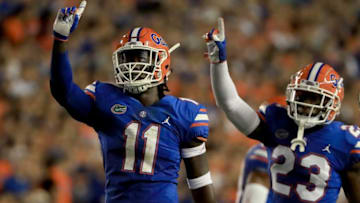 GAINESVILLE, FL - SEPTEMBER 01: Vosean Joseph #11 of the Florida Gators and Chauncey Gardner-Johnson #23 celebrate a defensive stop during the game against the Charleston Southern Buccaneers at Ben Hill Griffin Stadium on September 1, 2018 in Gainesville, Florida. (Photo by Sam Greenwood/Getty Images)