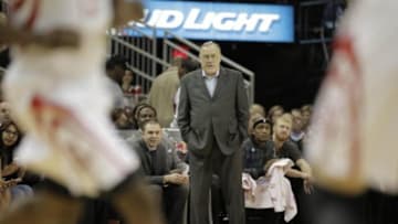 Mar 20, 2014; Houston, TX, USA; Minnesota Timberwolves head coach Rick Adelman watches from the bench during the first quarter against the Houston Rockets at Toyota Center. Mandatory Credit: Andrew Richardson-USA TODAY Sports