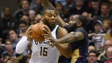 Mar 12, 2016; Milwaukee, WI, USA; Milwaukee Bucks center Greg Monroe (15) looks for a shot against New Orleans Pelicans center Kendrick Perkins (5) in the second quarter at BMO Harris Bradley Center. Mandatory Credit: Benny Sieu-USA TODAY Sports
