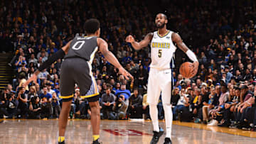 OAKLAND, CA - DECEMBER 23: Will Barton #5 of the Denver Nuggets handles the ball against the Golden State Warriors on December 23, 2017 at ORACLE Arena in Oakland, California. NOTE TO USER: User expressly acknowledges and agrees that, by downloading and or using this photograph, user is consenting to the terms and conditions of Getty Images License Agreement. Mandatory Copyright Notice: Copyright 2017 NBAE (Photo by Noah Graham/NBAE via Getty Images)