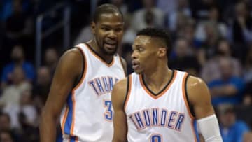 Jan 29, 2016; Oklahoma City, OK, USA; Oklahoma City Thunder forward Kevin Durant (35) and Oklahoma City Thunder guard Russell Westbrook (0) react after a play against the Houston Rockets at Chesapeake Energy Arena. Mandatory Credit: Mark D. Smith-USA TODAY Sports