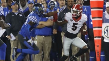 Nov 5, 2016; Lexington, KY, USA; Georgia Bulldogs wide receiver Terry Godwin (5) runs the ball against the Kentucky Wildcats in the second half at Commonwealth Stadium. Georgia defeated Kentucky 27-24. Mandatory Credit: Mark Zerof-USA TODAY Sports