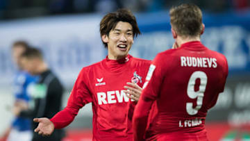 DARMSTADT, GERMANY - JANUARY 28: Artjoms Rudnevs of Koeln (R) celebrates his team's sixth goal with team mate Yuya Osako during the Bundesliga match between SV Darmstadt 98 and 1. FC Koeln at Jonathan-Heimes-Stadion am Boellenfalltor on January 28, 2017 in Darmstadt, Germany. (Photo by Simon Hofmann/Getty Images)