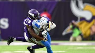 MINNEAPOLIS, MN - OCTOBER 1: Ameer Abdullah #21 of the Detroit Lions is tackled with the ball by defender Xavier Rhodes #29 of the Minnesota Vikings in the first quarter of the game on October 1, 2017 at U.S. Bank Stadium in Minneapolis, Minnesota. (Photo by Hannah Foslien/Getty Images)