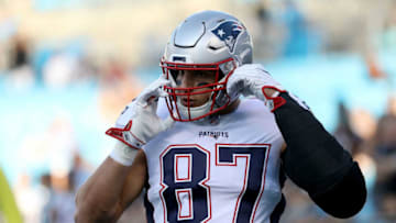 CHARLOTTE, NC - AUGUST 24: Rob Gronkowski #87 of the New England Patriots warms up before their game against the Carolina Panthers at Bank of America Stadium on August 24, 2018 in Charlotte, North Carolina. (Photo by Streeter Lecka/Getty Images)