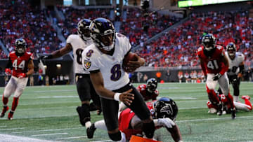 ATLANTA, GA - DECEMBER 02: Lamar Jackson #8 of the Baltimore Ravens rushes for a touchdown past Grady Jarrett #97 of the Atlanta Falcons at Mercedes-Benz Stadium on December 2, 2018 in Atlanta, Georgia. (Photo by Kevin C. Cox/Getty Images)
