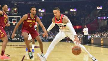 CLEVELAND, OHIO - NOVEMBER 10: Kyle Kuzma #33 of the Washington Wizards drives to the basket around Evan Mobley #4 of the Cleveland Cavaliers during the first half at Rocket Mortgage Fieldhouse on November 10, 2021 in Cleveland, Ohio. NOTE TO USER: User expressly acknowledges and agrees that, by downloading and/or using this photograph, user is consenting to the terms and conditions of the Getty Images License Agreement. (Photo by Jason Miller/Getty Images)