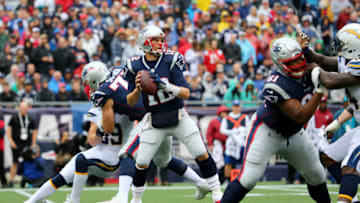 FOXBORO, MA - OCTOBER 29: Tom Brady #12 of the New England Patriots looks for a pass during the first half against the Los Angeles Chargers at Gillette Stadium on October 29, 2017 in Foxboro, Massachusetts. (Photo by Maddie Meyer/Getty Images)