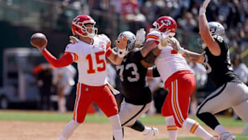 OAKLAND, CA - SEPTEMBER 15: Patrick Mahomes #15 of the Kansas City Chiefs gets his pass off under pressure from Maurice Hurst #73 of the Oakland Raiders during the second quarter of an NFL football game at RingCentral Coliseum on September 15, 2019 in Oakland, California. (Photo by Thearon W. Henderson/Getty Images)
