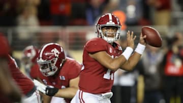 SANTA CLARA, CA - JANUARY 07: Tua Tagovailoa #13 of the Alabama Crimson Tide looks to pass against the Clemson Tigers in the CFP National Championship presented by AT&T at Levi's Stadium on January 7, 2019 in Santa Clara, California. (Photo by Sean M. Haffey/Getty Images)