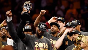 Jun 19, 2016; Oakland, CA, USA; Cleveland Cavaliers forward LeBron James (23) celebrates with the Bill Russell MVP Trophy after beating the Golden State Warriors in game seven of the NBA Finals at Oracle Arena. Mandatory Credit: Bob Donnan-USA TODAY Sports