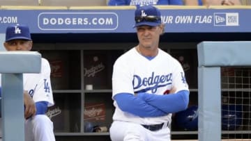 Jun 1, 2014; Los Angeles, CA, USA; Los Angeles Dodgers manager Don Mattingly (8) looks on during the sixth inning against the Pittsburgh Pirates at Dodger Stadium. Mandatory Credit: Richard Mackson-USA TODAY Sports