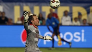 Aug 4, 2014; Miami Gardens, FL, USA; Liverpool goalkeeper Simon Mignolet (22) gives up a goal to Manchester United midfielder Anderson (not pictured) in the second half at Sun Life Stadium. Mandatory Credit: Robert Mayer-USA TODAY Sports
