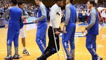 Dec 28, 2015; Durham, NC, USA; Duke Blue Devils forward Amile Jefferson (C) walks on crutches on the court prior to the game against the Elon Phoenix at Cameron Indoor Stadium. Mandatory Credit: Mark Dolejs-USA TODAY Sports