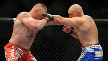 LAS VEGAS - JULY 03: (L-R) Brock Lesnar and Shane Carwin exchange blows during the UFC Heavyweight Championship Unification bout at the MGM Grand Garden Arena on July 3, 2010 in Las Vegas, Nevada. (Photo by Jon Kopaloff/Zuffa LLC/Zuffa LLC via Getty Images)