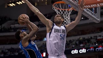 Mar 1, 2016; Dallas, TX, USA; Dallas Mavericks center Salah Mejri (50) blocks a shot by Orlando Magic forward Devyn Marble (11) during the second half at the American Airlines Center. The Mavericks defeat the Magic 121-108. Mandatory Credit: Jerome Miron-USA TODAY Sports