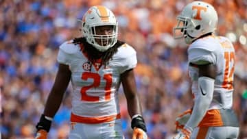 Sep 26, 2015; Gainesville, FL, USA; Tennessee Volunteers linebacker Jalen Reeves-Maybin (21) and defensive back Emmanuel Moseley (12) during the first quarter at Ben Hill Griffin Stadium. Mandatory Credit: Kim Klement-USA TODAY Sports