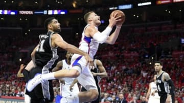 Apr 19, 2015; Los Angeles, CA, USA; Los Angeles Clippers forward Blake Griffin (32) drives to the basket against San Antonio Spurs forward Tim Duncan (21) during the first quarter in game one of the first round of the NBA Playoffs at Staples Center. Mandatory Credit: Richard Mackson-USA TODAY Sports