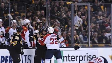 Dec 12, 2015; Boston, MA, USA; Florida Panthers right wing Shawn Thornton (22) fights with Boston Bruins center Zac Rinaldo (36) during the third period at TD Garden. Mandatory Credit: Bob DeChiara-USA TODAY Sports