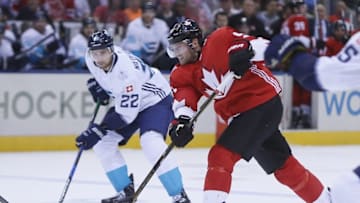 Sep 21, 2016; Toronto, Ontario, Canada; Team Canada forward Steven Stamkos (91) takes a shot as Team Europe forward Nino Niederreiter (22) looks on during preliminary round play in the 2016 World Cup of Hockey at Air Canada Centre. Team Canada defeated Team Europe 4-1. Mandatory Credit: John E. Sokolowski-USA TODAY Sports
