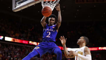 AMES, IA - JANUARY 16: Lagerald Vick #2 of the Kansas Jayhawks dunks the ball as Nick Weiler-Babb #1 of the Iowa State Cyclones watches on in the second half of play at Hilton Coliseum on January 16, 2017 in Ames, Iowa. The Kansas Jayhawks won 76-72 over the Iowa State Cyclones. (Photo by David Purdy/Getty Images)