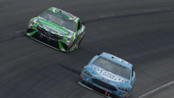 FORT WORTH, TX - APRIL 08: Kevin Harvick, driver of the #4 Busch Light Ford, leads Kyle Busch, driver of the #18 Interstate Batteries Toyota (Photo by Sean Gardner/Getty Images)