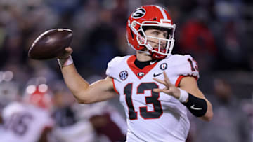 STARKVILLE, MISSISSIPPI - NOVEMBER 12: Stetson Bennett #13 of the Georgia Bulldogs throws the ball against the Mississippi State Bulldogs during a game at Davis Wade Stadium on November 12, 2022 in Starkville, Mississippi. (Photo by Jonathan Bachman/Getty Images)