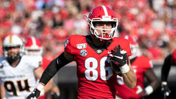 ATHENS, GA - SEPTEMBER 7: John FitzPatrick #86 of the Georgia Bulldogs tries to elude Tay Carothers #44 of Murray State after catching a pass during a game between Murray State Racers and University of Georgia Bulldogs at Sanford Stadium on September 7, 2019 in Athens, Georgia. (Photo by Steve Limentani/ISI Photos/Getty Images).