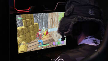 LAS VEGAS, NV - APRIL 21: A gamer plays "Fortnite" against Twitch streamer and professional gamer Tyler "Ninja" Blevins during Ninja Vegas '18 at Esports Arena Las Vegas at Luxor Hotel and Casino on April 21, 2018 in Las Vegas, Nevada. Blevins is playing against more than 230 challengers in front of 700 fans in 10 live "Fortnite" games with up to USD 50,000 in cash prizes on the line. He is donating all his winnings to the Alzheimer's Association. (Photo by Ethan Miller/Getty Images)