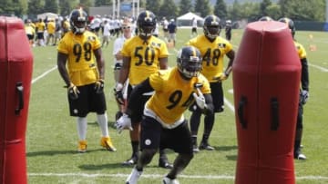 Jun 17, 2014; Pittsburgh, PA, USA; Pittsburgh Steelers linebacker Lawrence Timmons (94) participates in drills during minicamp at the UPMC Sports Performance Complex. Mandatory Credit: Charles LeClaire-USA TODAY Sports