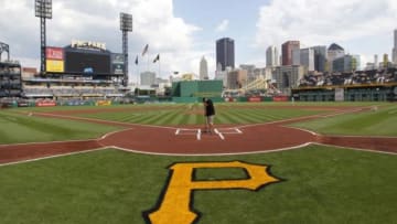 Aug 8, 2015; Pittsburgh, PA, USA; The grounds crew puts final touches on the field before the Pittsburgh Pirates host the Los Angeles Dodgers at PNC Park. Mandatory Credit: Charles LeClaire-USA TODAY Sports