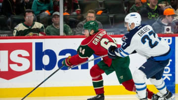 Nov 23, 2016; Saint Paul, MN, USA; Minnesota Wild forward Mikael Granlund (64) passes the puck past Winnipeg Jets forward Nikolaj Ehlers (27) during the second period at Xcel Energy Center. Mandatory Credit: Brace Hemmelgarn-USA TODAY Sports
