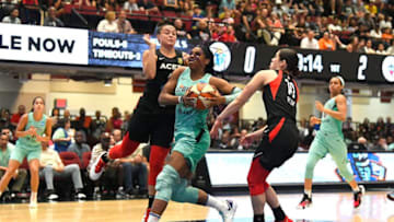 WHITE PLAINS, NY- JULY: Reshanda Gray #12 of the New York Liberty drives through the paint during the game against Kelsey Plum #10 of the Las Vegas Aces on JULY 7, 2019 at the Westchester County Center, in White Plains, New York. NOTE TO USER: User expressly acknowledges and agrees that, by downloading and or using this photograph, User is consenting to the terms and conditions of the Getty Images License Agreement. Mandatory Copyright Notice: Copyright 2019 NBAE (Photo by Catalina Fragoso/NBAE via Getty Images)