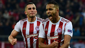 Olympiakos' Moroccan forward Youssef El-Arabi (R) celebrates scoring a penalty with Olympiakos' Norwegian defender Omar Elabdellaoui during UEFA Champions League during the Group B football match between Olympiacos FC and FK Crvena zvezda (Red Star Belgrade) at the Karaiskakis Stadium in Piraeus, near Athens, on December 11, 2019. (Photo by ARIS MESSINIS / AFP) (Photo by ARIS MESSINIS/AFP via Getty Images)