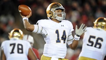 November 28, 2015; Stanford, CA, USA; Notre Dame Fighting Irish quarterback DeShone Kizer (14) throws against Stanford Cardinal during the second half at Stanford Stadium. Mandatory Credit: Gary A. Vasquez-USA TODAY Sports