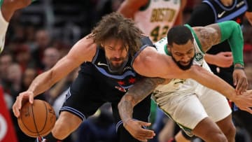CHICAGO, ILLINOIS - FEBRUARY 23: Marcus Morris #13 of the Boston Celtics fouls Robin Lopez #42 of the Chicago Bulls as they battle for the ball at the United Center on February 23, 2019 in Chicago, Illinois. The Bulls defeated the Celtics 126-116. NOTE TO USER: User expressly acknowledges and agrees that, by downloading and or using this photograph, User is consenting to the terms and conditions of the Getty Images License Agreement. (Photo by Jonathan Daniel/Getty Images)