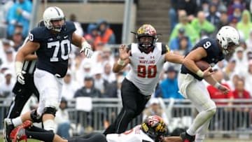 Oct 8, 2016; University Park, PA, USA; Penn State Nittany Lions quarterback Trace McSorley (9) runs with the ball while attempting to avoid a tackle during the second quarter against the Maryland Terrapins at Beaver Stadium. Penn State defeated Maryland 38-14. Mandatory Credit: Matthew O