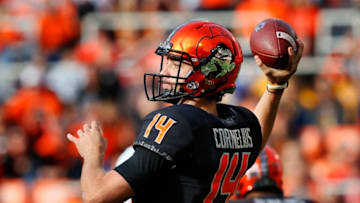 STILLWATER, OK - NOVEMBER 17: Quarterback Taylor Cornelius #14 of the Oklahoma State Cowboys throws against the the West Virginia Mountaineers in the first quarter on November 17, 2018 at Boone Pickens Stadium in Stillwater, Oklahoma. (Photo by Brian Bahr/Getty Images)