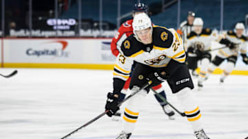 WASHINGTON, DC - MAY 11: Jack Studnicka #23 of the Boston Bruins looks to shoot the puck against the Washington Capitals during the first period of the game at Capital One Arena on May 11, 2021 in Washington, DC. (Photo by Scott Taetsch/Getty Images)