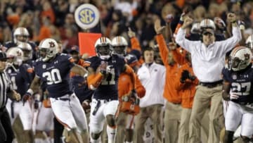Nov 30, 2013; Auburn, AL, USA; Auburn Tigers cornerback Chris Davis (11) returns a missed field goal for a 100 yard touchdown against the Alabama Crimson Tide during the fourth quarter at Jordan Hare Stadium. Auburn won 34-28. Mandatory Credit: John Reed-USA TODAY Sports