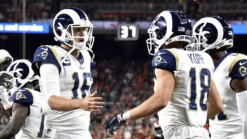 CLEVELAND, OHIO - SEPTEMBER 22: Quarterback Jared Goff #16 celebrates with wide receiver Cooper Kupp #18 of the Los Angeles Rams after the two connected for a touchdown against the Cleveland Browns during the fourth quarter at FirstEnergy Stadium on September 22, 2019 in Cleveland, Ohio. (Photo by Jason Miller/Getty Images)