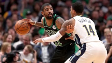 DENVER, CO - JANUARY 29: Kyrie Irving #11 of the Boston Celtics is guarded by Gary Harris #14 of the Denver Nuggets at the Pepsi Center on January 29, 2018 in Denver, Colorado. NOTE TO USER: User expressly acknowledges and agrees that, by downloading and or using this photograph, User is consenting to the terms and conditions of the Getty Images License Agreement. (Photo by Matthew Stockman/Getty Images)