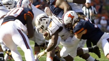 Sep 17, 2016; Champaign, IL, USA; Western Michigan Broncos running back Leo Ekwoge (33) is stopped just short of the goal line against the Illinois Fighting Illini during the 1st quarter at Memorial Stadium. Mandatory Credit: Mike Granse-USA TODAY Sports