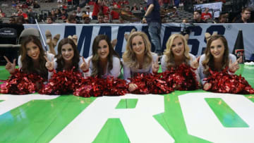 DALLAS, TX - MARCH 15: Members of the Texas Tech cheerleaders smile before the Texas Tech Red Raiders take on the Stephen F. Austin Lumberjacks in the first round of the 2018 NCAA Men's Basketball Tournament at American Airlines Center on March 15, 2018 in Dallas, Texas. (Photo by Ronald Martinez/Getty Images)