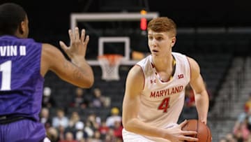 Nov 26, 2016; Brooklyn, NY, USA; Maryland Terrapins guard Kevin Huerter (4) looks inside against the Kansas State Wildcats during the first half of the championship game of the Barclays Center Classic at Barclays Center. Mandatory Credit: Vincent Carchietta-USA TODAY Sports