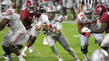 MIAMI GARDENS, FLORIDA - JANUARY 11: Justin Fields #1 of the Ohio State Buckeyes moves in the pocket during the College Football Playoff National Championship football game against the Alabama Crimson Tide at Hard Rock Stadium on January 11, 2021 in Miami Gardens, Florida. The Alabama Crimson Tide defeated the Ohio State Buckeyes 52-24. (Photo by Alika Jenner/Getty Images)